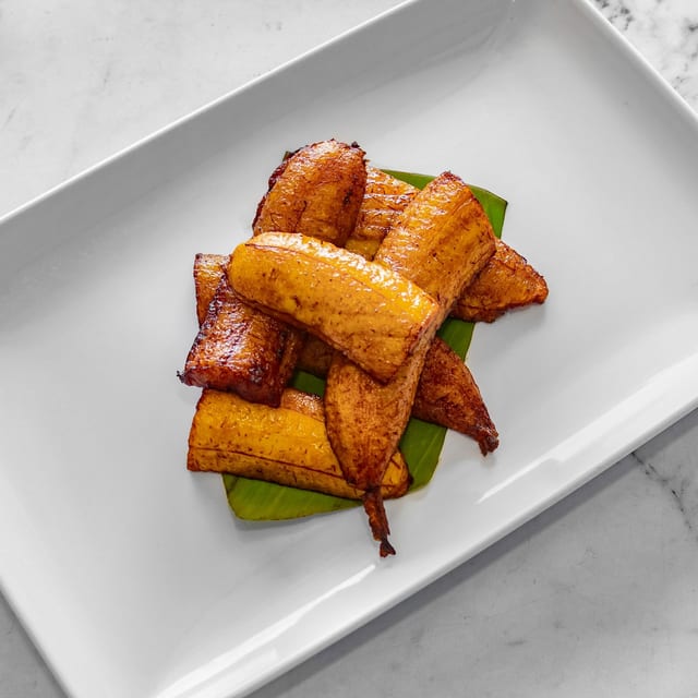 Platnos Fritos Solos (Fried Plantains Only).